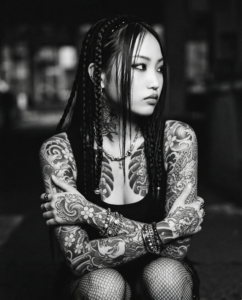 Tattooed 25 yo Asian woman