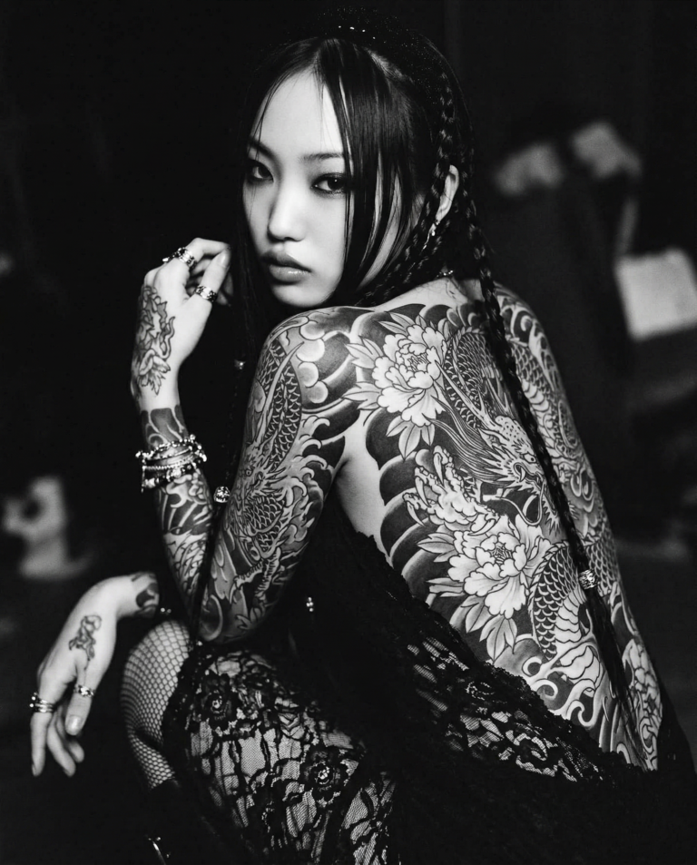 Tattooed back of a 25 yo Asian woman